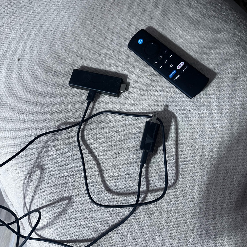 Amazon Fire TV Stick with Voice Remote - Black and Blue